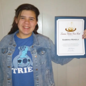 Sabrina holding LVS award