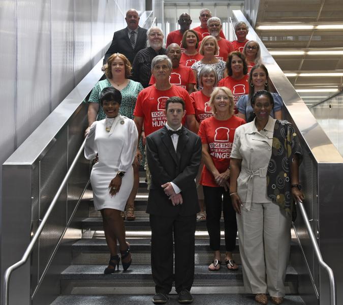 Group of people exiting a staircase