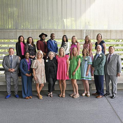 2025 Champions of Service honorees pose in two rows with Lt. Governor Billy Nungesser