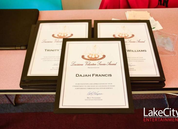 3 Louisiana Volunteer Services awards on a table