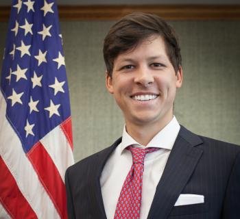 Matt LaBorde in front of the American flag