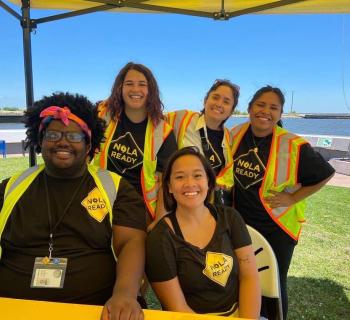 NOLA Ready Volunteer Corps team at a table