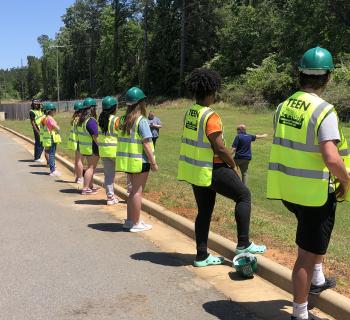 Union Parish Teen CERT Team standing in a line on the side of the road